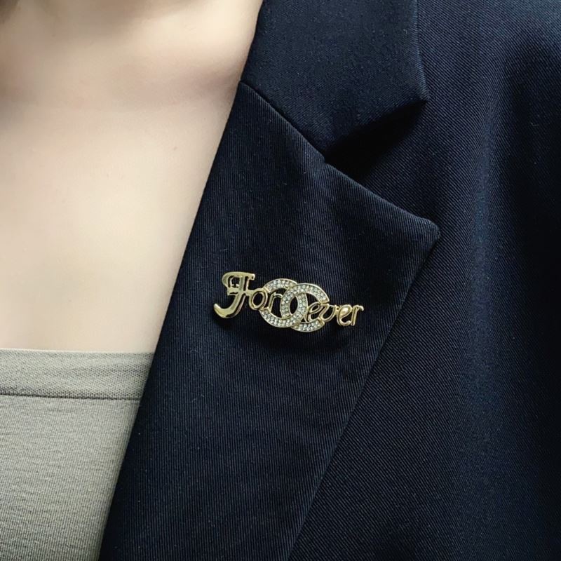 Ch*el brooches